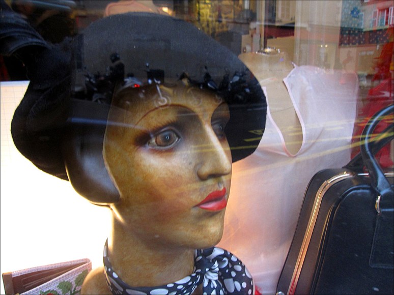 Reflecting on the rooftops and retro duds in the Marais at twilight Photos by Theadora Brack