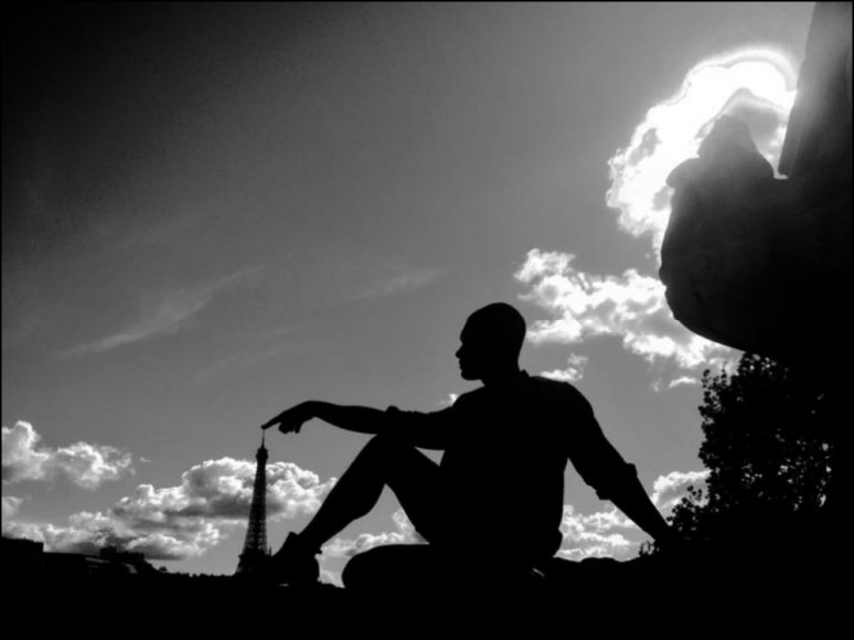 Riley Brack on the Pont Alexandre III with the Eiffel Tower in view (Photo by Peter Brack)