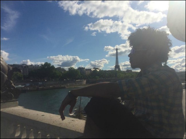 Peter Brack on the Pont Alexandre III with the Eiffel Tower in view (Photograph by Riley Brack)