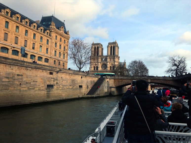Paying tribute to Notre-Dame (Photo by Theadora Brack, River Boat Ride, March 2019)